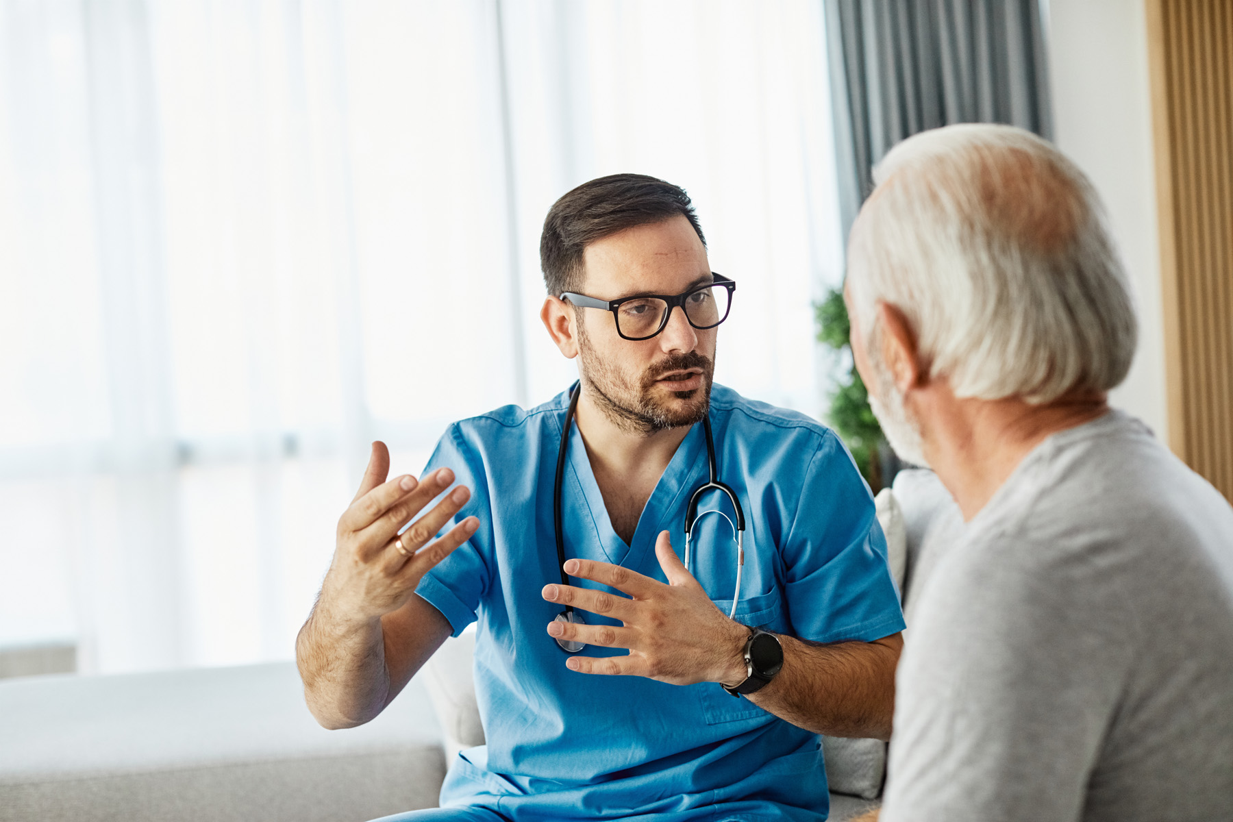 doctor talking to patient